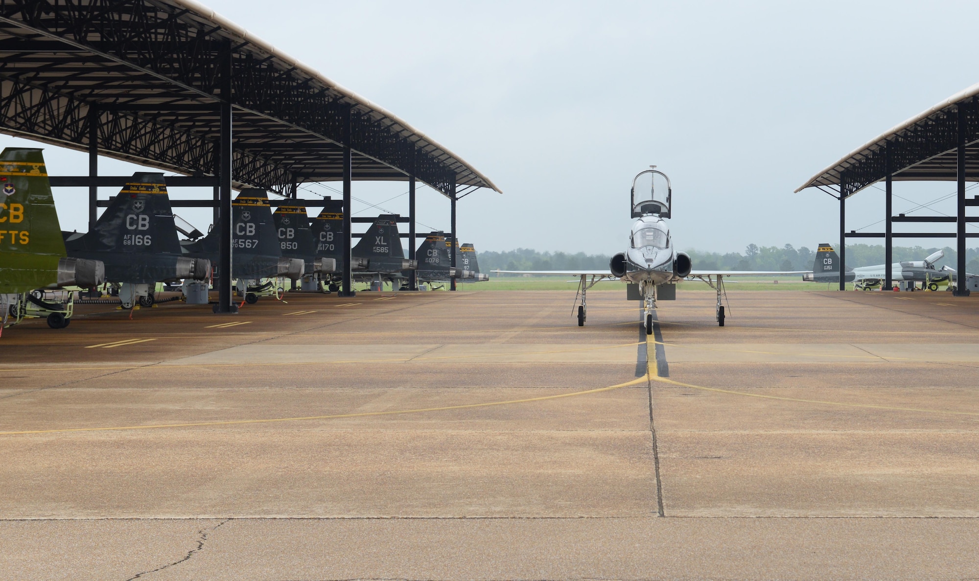 A T-38 Talon taxis toward a hangar April 8, 2020, at Columbus Air Force Base, Miss. The Air Education and Training Command is the primary user of the T-38 for joint specialized undergraduate pilot training. Pilot training has been deemed essential operations and continues amid the COVID-19 pandemic. (U.S. Air Force photo by Airman 1st Class Davis Donaldson)