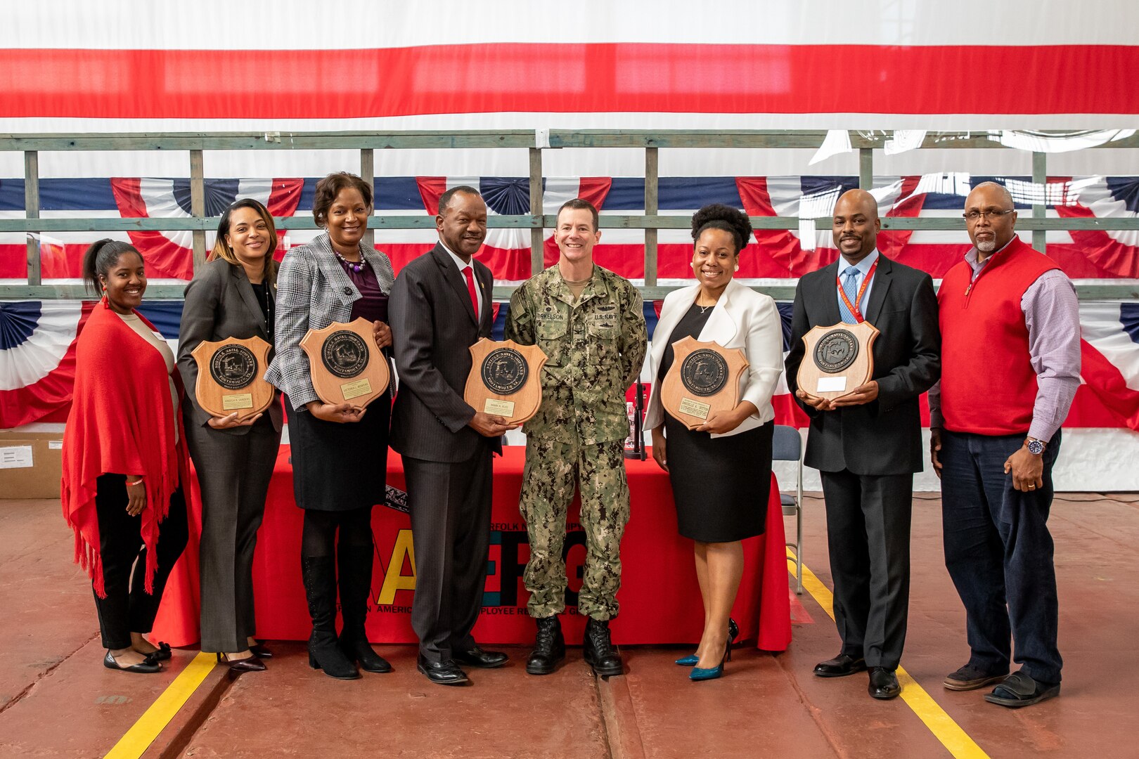 The panelists were awarded a Certificate of Appreciation from the African American Employee Resource Group (AA-ERG) and a shipyard plaque. Pictured are the panelists with Capt. Kai. Torkelson with Co-chairs Ciara Mason (far left) and Michael Taylor (far right).