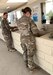 Soldiers assigned to Task Force Spartan Shield wash their hands at the entrance of a dining facility April 8, 2020, in the U.S. Central Command area of operations. To help prevent the spread of COVID-19, the Centers for Disease Control and Prevention recommends washing your hands often with soap and water for at least 20 seconds. The CDC also recommends disinfecting frequently touched surfaces, avoiding close contact with those who are sick, covering coughs and sneezes with a tissue, cloth, or the inside of your elbow and observing social distancing guidance. (U.S. Army National Guard photo by Master Sgt. Thomas Wheeler, Task Force Spartan Public Affairs)