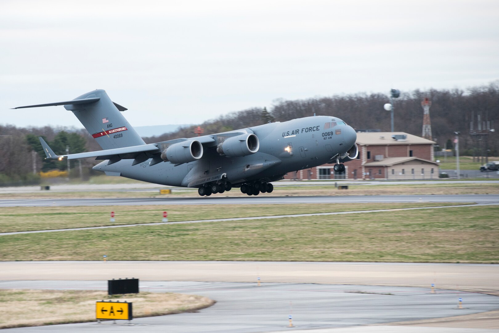 A West Virginia Air National Guard C-17 Globemaster III aircraft launches from Shepherd Field, Martinsburg, W.Va., March 24, 2020, to pick up two Disaster Relief Bed-Down Sets in Puerto Rico and return them to Mansfield, Ohio. The Guard's 167th Airlift Wing is suspending training but continuing missions during the COVID-19 pandemic.