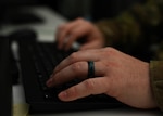 A member of the Maryland National Guard Joint Task Force Cyber April 3, 2020, at the 175th Wing at Warfield Air National Guard Base, Middle River, Md. The MDNG JTF-Cyber team is protecting and evaluating Maryland government websites to ensure they are functioning properly and the information presented is accurate.