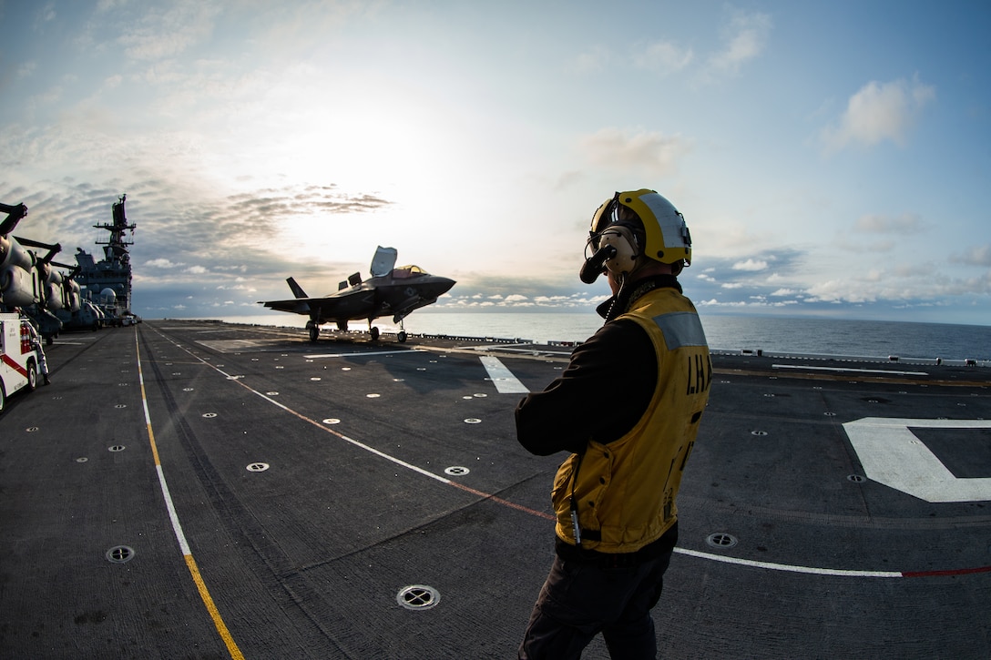 An F-35B Lightning II fighter aircraft, prepares to take off from amphibious assault ship USS America (LHA 6) during flight operations.
