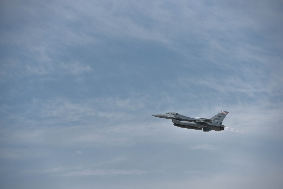 An F-16 Fighting Falcon from the 115th Fighter Wing takes off at Dane County Regional Airport, Madison, Wisconsin April 7, 2020.