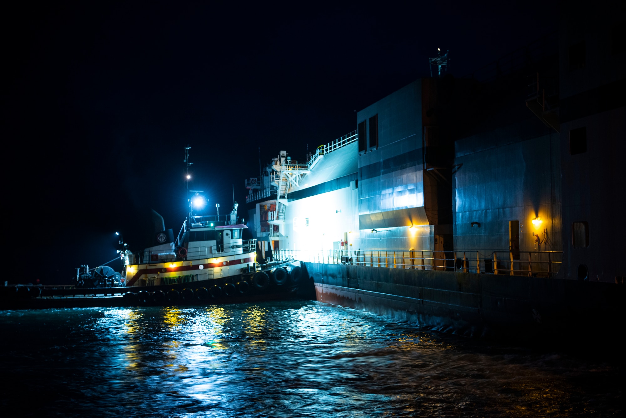 A United Launch Alliance barge, known as the RocketShip, docks April 5, 2020, at Vandenberg Air Force Base, Calif. The barge docked at Vandenberg AFB to offload Delta IV Heavy boosters for an upcoming launch scheduled to occur later this year. The barge operation is a vital first step to executing the mission of assured access to space. (U.S. Air Force photo by Senior Airman Aubree Owens)