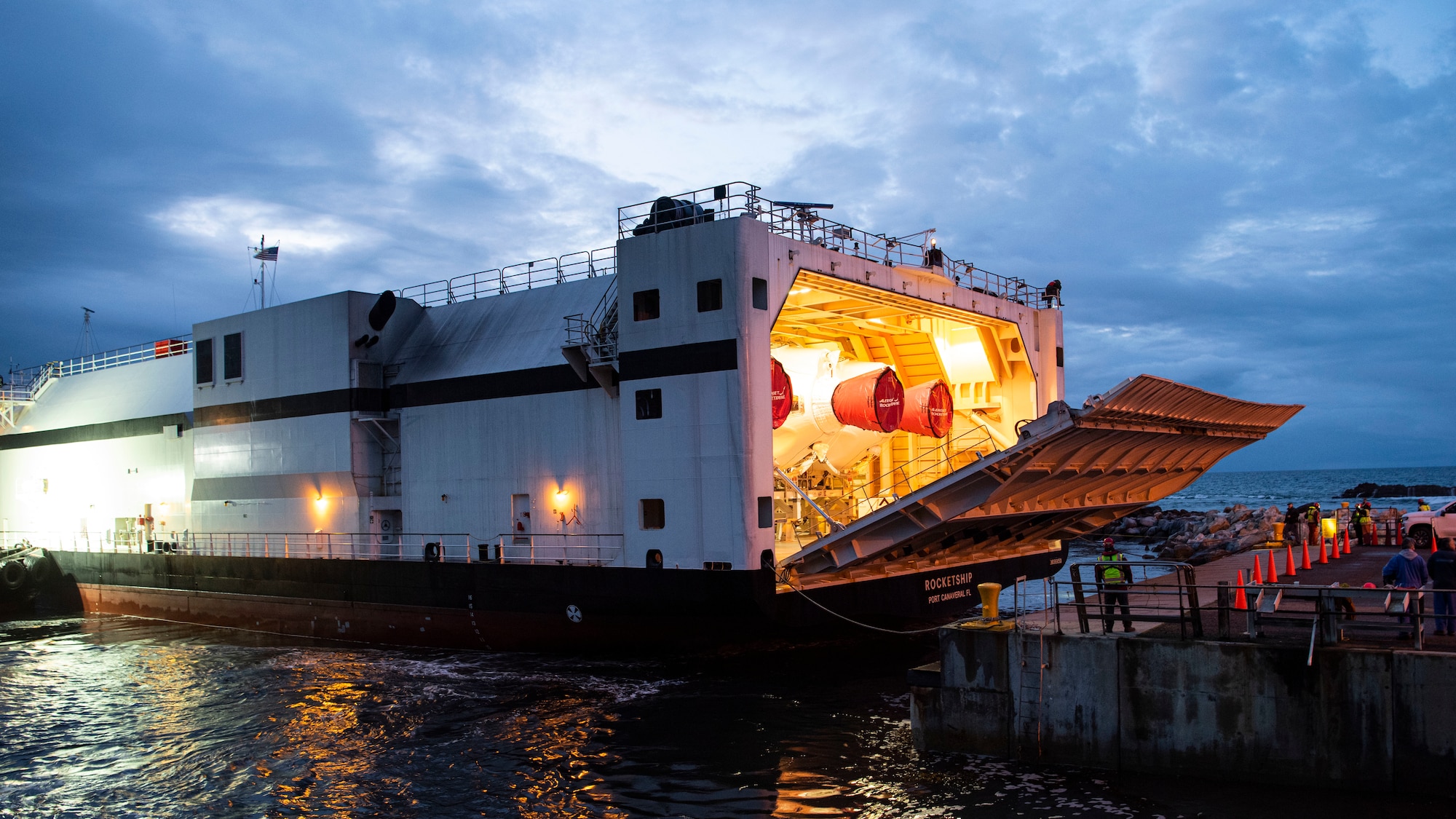 The hatch opens on a United Launch Alliance barge, known as the RocketShip, revealing Delta IV Heavy boosters April 5, 2020, at Vandenberg Air Force Base, Calif. The barge docked at Vandenberg AFB to offload Delta IV Heavy boosters for an upcoming launch scheduled to occur later this year. The barge operation is a vital first step to executing the mission of assured access to space. (U.S. Air Force photo by Senior Airman Aubree Owens)