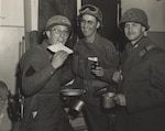 U.S. Army Soldiers serving with the 42nd Infantry Division in World War II celebrate the Jewish holiday of Passover in Dahn, Germany, March 28, 1945, just over a month before the German surrender. Chaplain (Maj.) Eli Bohnen, a rabbi serving with the division, and his assistant, Cpl. Eli Heimberg, created a division Haggadah specifically for the Passover seder. The division Haggadah is believed to be the first Jewish ritual printing in Germany since the rise of the Nazis to power in 1933.
