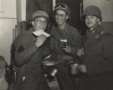 U.S. Army Soldiers serving with the 42nd Infantry Division in World War II celebrate the Jewish holiday of Passover in Dahn, Germany, March 28, 1945, just over a month before the German surrender. Chaplain (Maj.) Eli Bohnen, a rabbi serving with the division, and his assistant, Cpl. Eli Heimberg, created a division Haggadah specifically for the Passover seder. The division Haggadah is believed to be the first Jewish ritual printing in Germany since the rise of the Nazis to power in 1933.