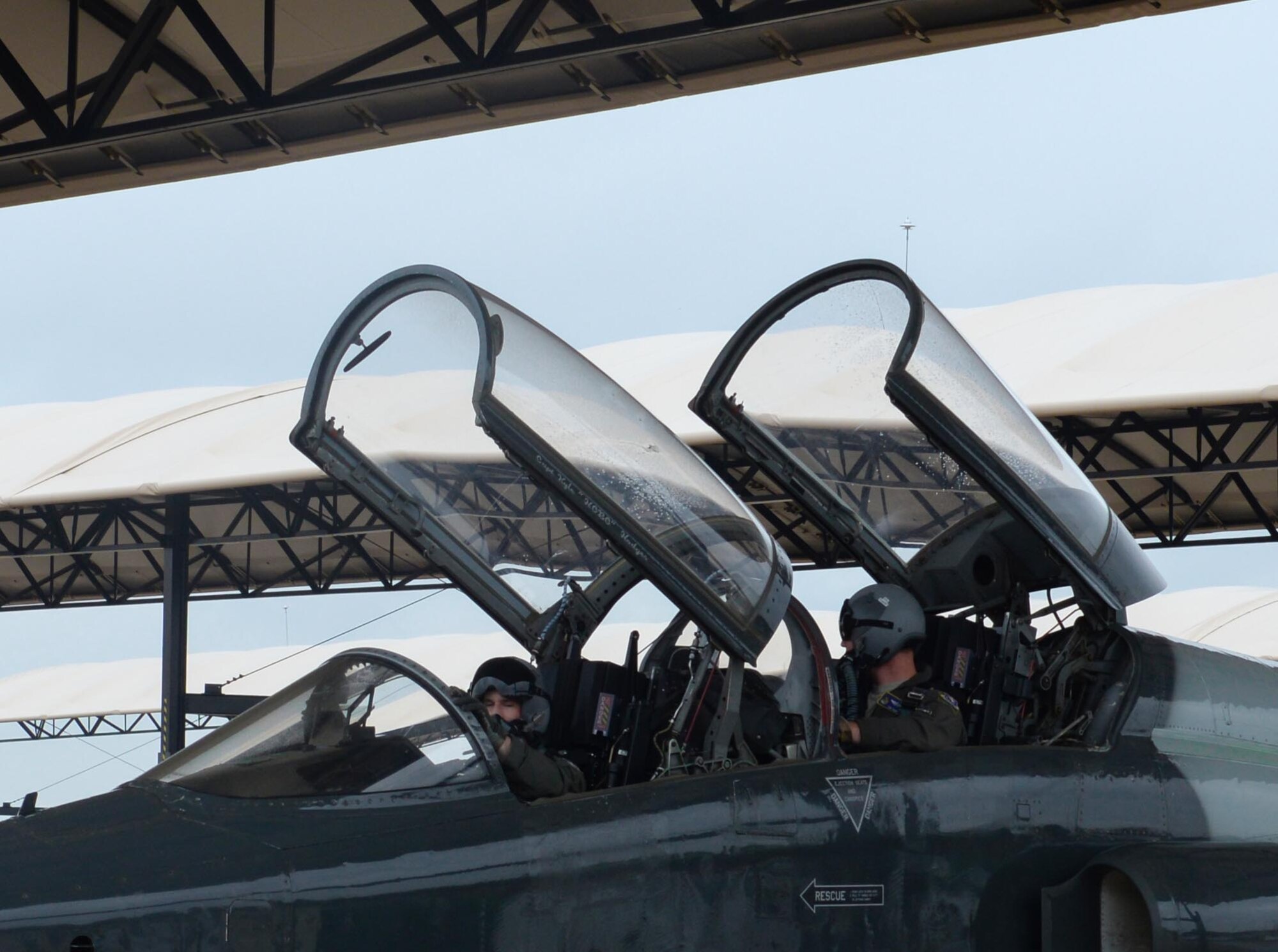 Two 14th Flying Training Wing pilots sit in the cockpit of a T-38 Talon April 8, 2020, at Columbus Air Force Base, Miss. Pilot training has been deemed essential operations and continues amid the COVID-19 pandemic. (U.S. Air Force photo by Airman 1st Class Davis Donaldson)
