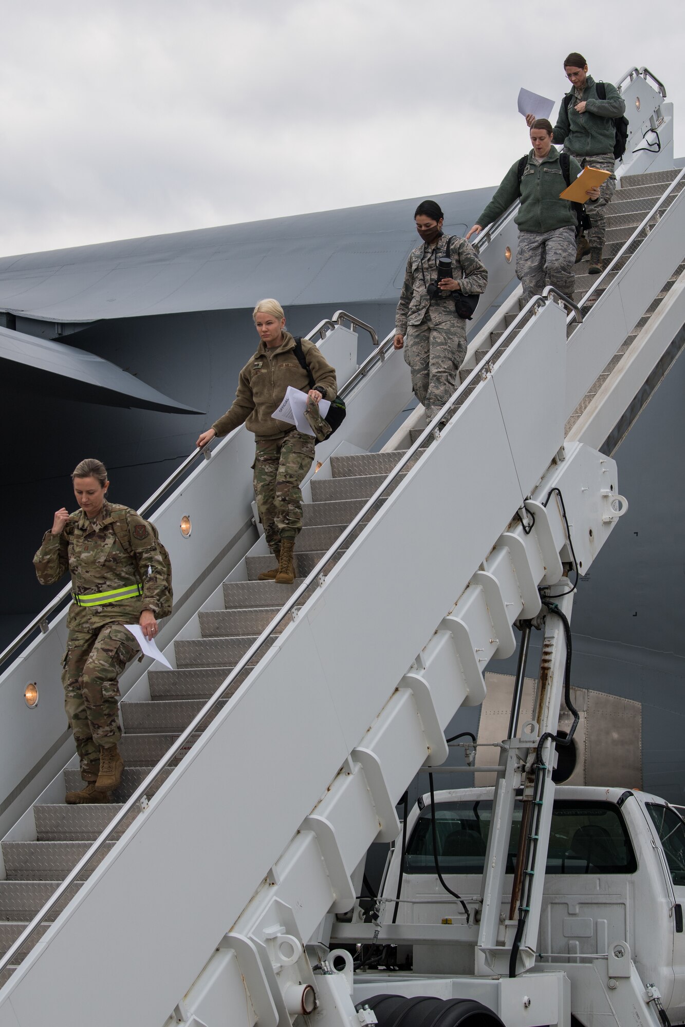 A U.S. Air Force Reserve C-5M Super Galaxy with the 68th Airlift Squadron, 433rd Airlift Wing, offloads medical personnel at Joint Base McGuire-Dix-Lakehurst, N.J., after stops at Lackland Air Force Base and Naval Air Station Joint Reserve Base Fort Worth, to support the residents of New York City in the fight against COVID-19, April 5, 2020. This deployment is part of a larger mobilization package of more than 120 doctors, nurses and respiratory technicians that Air Force Reserve units across the nation provided over the past forty-eight hours in support of COVID-19 response to take care of Americans.