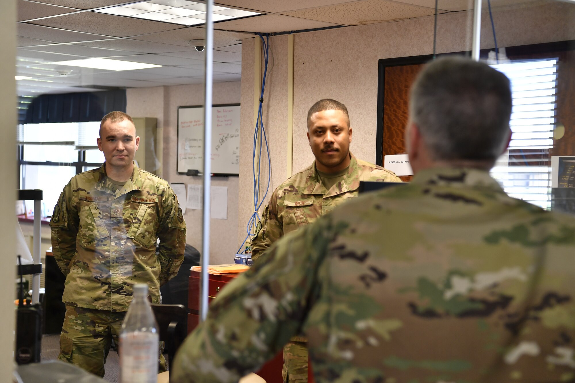 Photo of Chapel team talking with personnel.