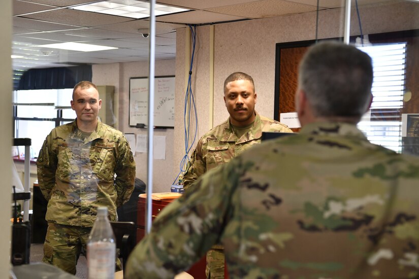 Photo of Chapel team talking with personnel.