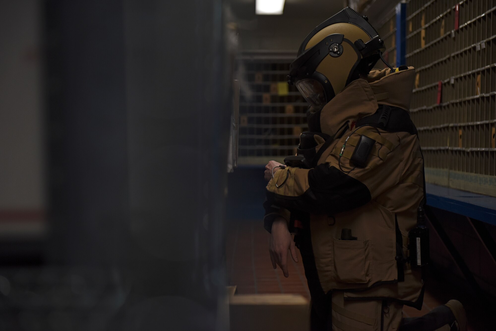 Staff Sgt. Tyler McMillan Wammack, 8th Civil Engineer Squadron Explosive Ordnance Disposal technician, identifies the simulated improvised explosive device at the base post office during a training event at Kunsan Air Base, Republic of Korea, April 8, 2020. Training benefits EOD technicians by giving them the opportunity to gain experience on how IEDs are built and how best to identify them in the field. (U.S. Air Force photo by Staff Sgt. Mackenzie Mendez)