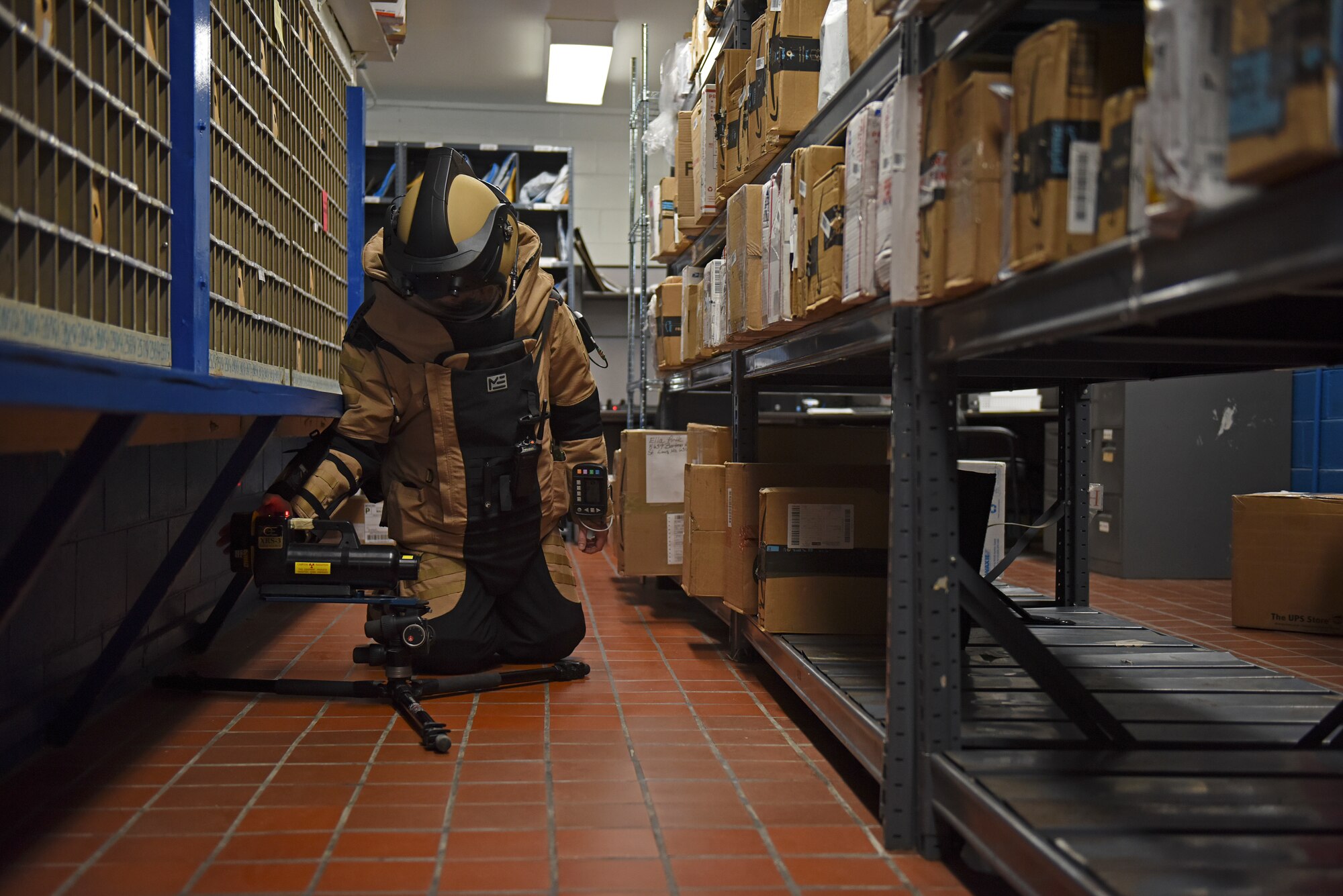 Staff Sgt. Tyler McMillan Wammack, 8th Civil Engineer Squadron Explosive Ordnance Disposal technician, captures x-rays of the simulated improvised explosive device at the base post office during a training event at Kunsan Air Base, Republic of Korea, April 8, 2020. Technicians learn to use robots, x-ray equipment, bomb suits and specialized EOD tools and techniques to disable IEDs in the field. (U.S. Air Force photo by Staff Sgt. Mackenzie Mendez)
