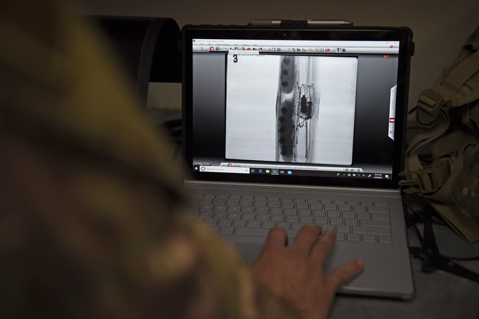 An Airman assigned to the 8th Civil Engineer Squadron Explosive Ordnance Disposal flight analyzes an x-ray of the simulated improvised explosive device during a training event at Kunsan Air Base, Republic of Korea, April 8, 2020. Technicians learn to use robots, x-ray equipment, bomb suits and specialized EOD tools and techniques to disable IEDs in the field. (U.S. Air Force photo by Staff Sgt. Mackenzie Mendez)