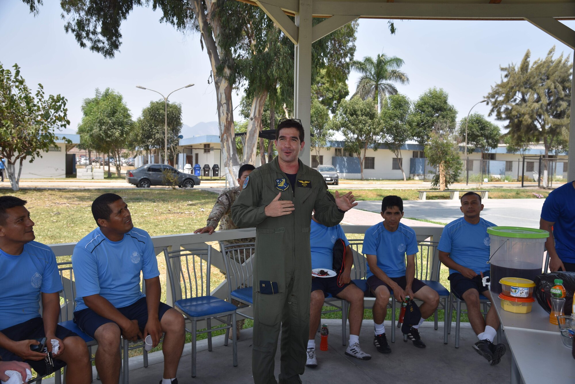 Peruvian Air Force Lt. Alfonso Reyes gives a short speech thanking instructors from the 571st Mobility Support Advisory Squadron at Callao Air Base in Lima, Perú. The 571st MSAS is a language enabled squadron of air advisors who assess, train, advise and assist Latin American and Caribbean partner nations in the development of their airpower capabilities as part of the U.S. Air Force’s and Air Mobility Command’s enduring building partner capacity mission. (courtesy photo)