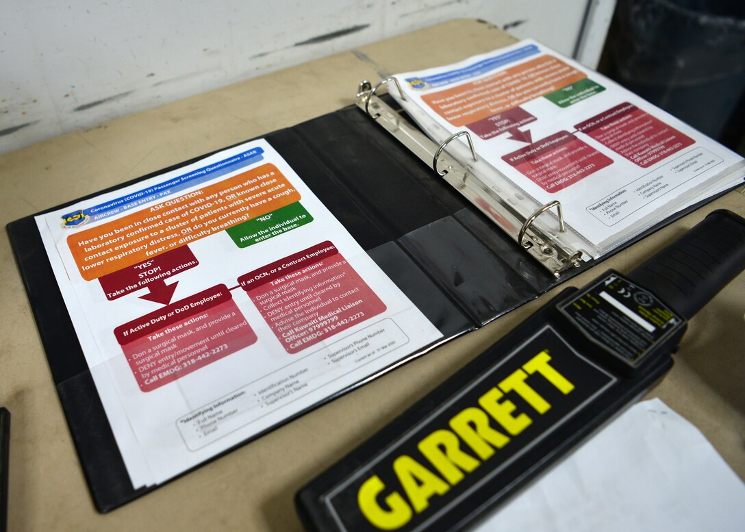 COVID screening questionnaire sits on a table.