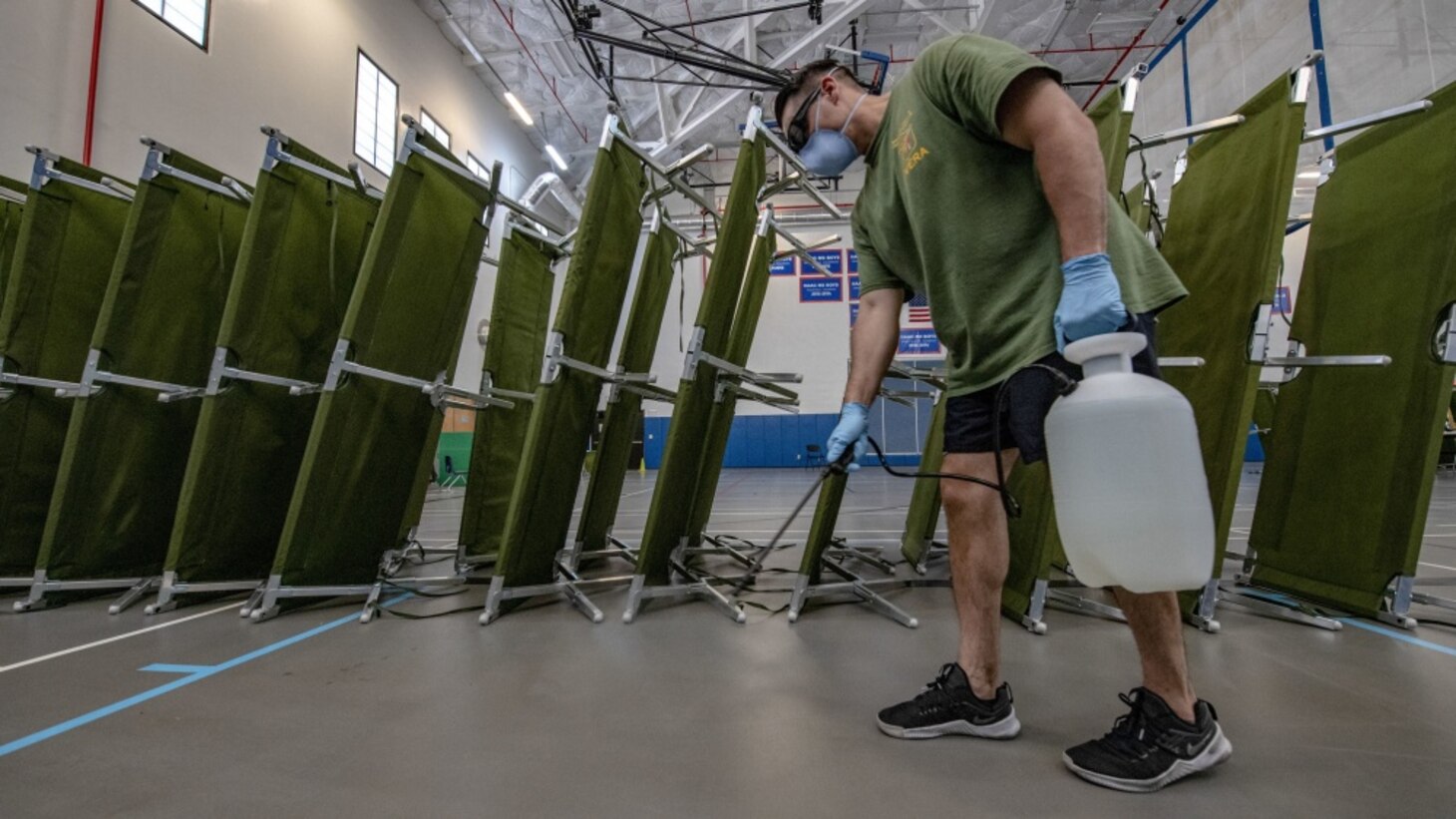 NAVAL BASE GUAM (April 9, 2020) Hospital Corpsman 1st Class Frank Rivera assigned to 3rd Medical Battalion, 3rd Marine Logistics Group, sterilize a building in support of USS Theodore Roosevelt (CVN 71) Sailors. Theodore Roosevelt is docked at Naval Base Guam where Sailors from the ship are practicing social distancing and following other guidelines from the CDC, U.S. Navy and the Governor of Guam as part of a COVID-19 mitigation effort during a scheduled deployment to the Indo-Pacific.