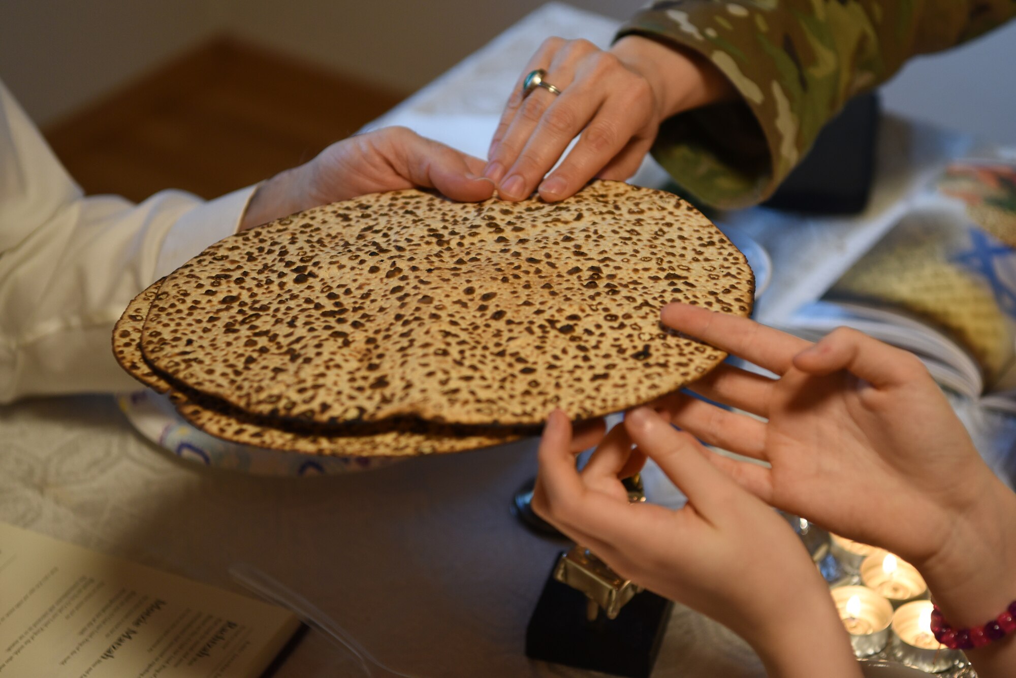 U.S. Air Force Maj. Sarah Schechter, 86th Airlift Wing staff chaplain, and her family lead a virtual Passover Seder from their home in Kaiserslautern, Germany, April 8, 2020.