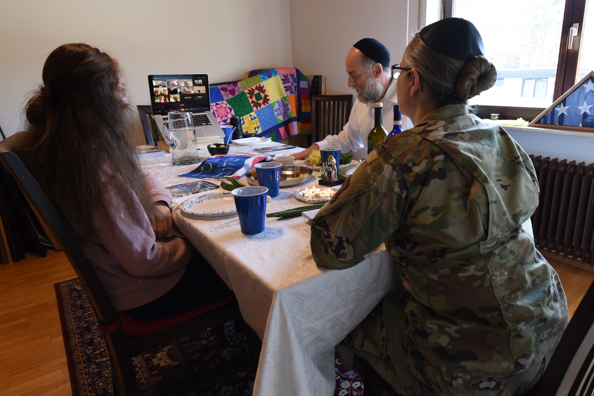 U.S. Air Force Maj. Sarah Schechter, 86th Airlift Wing staff chaplain, and her family lead a virtual Passover Seder from their home in Kaiserslautern, Germany, April 8, 2020.