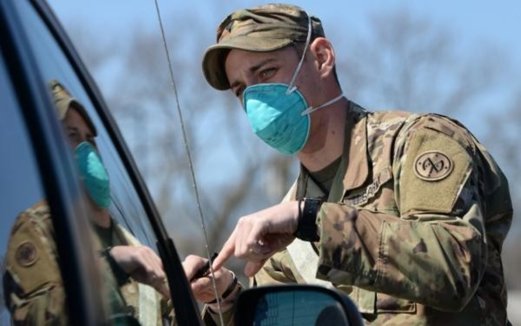 Soldier checking ID