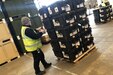 A worker prepares a pallet of medical devices for shipping to Landstuhl Regional Medical Center in Germany on March 30.