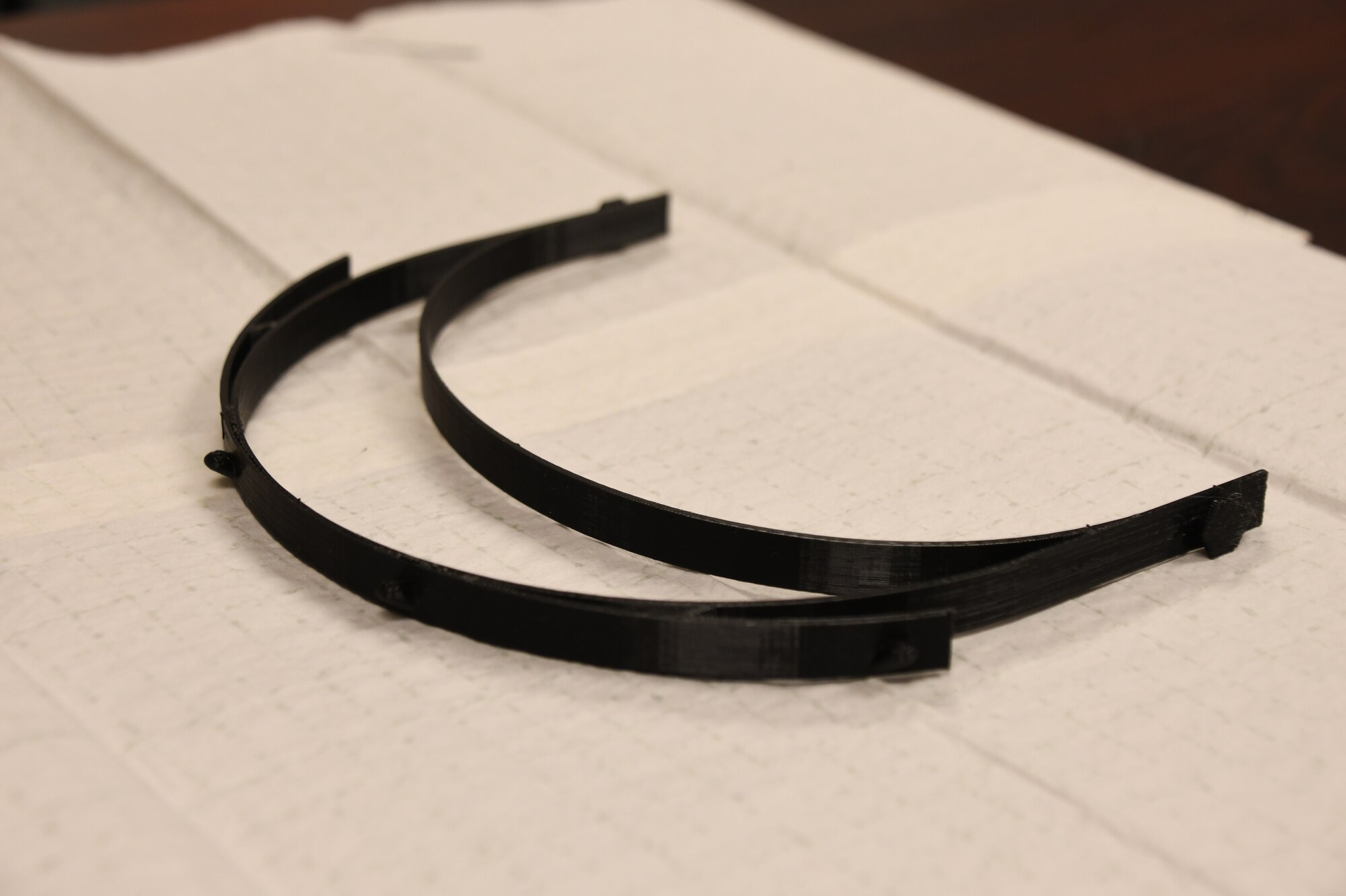 Senior Master Sgt. Jeremiah Mcclosky, Explosive Ordnance Disposal Superintendent, 104th Fighter Wing, prints a protective mask from a 3D printer for the 104th Fighter Wing Medical Group. The 104th Fighter Wing Medical Group is responding to state COVID-19 response efforts throughout the state of Massachusetts. (U.S. Air National Guard photo by Airman 1st Class Sara Kolinski)