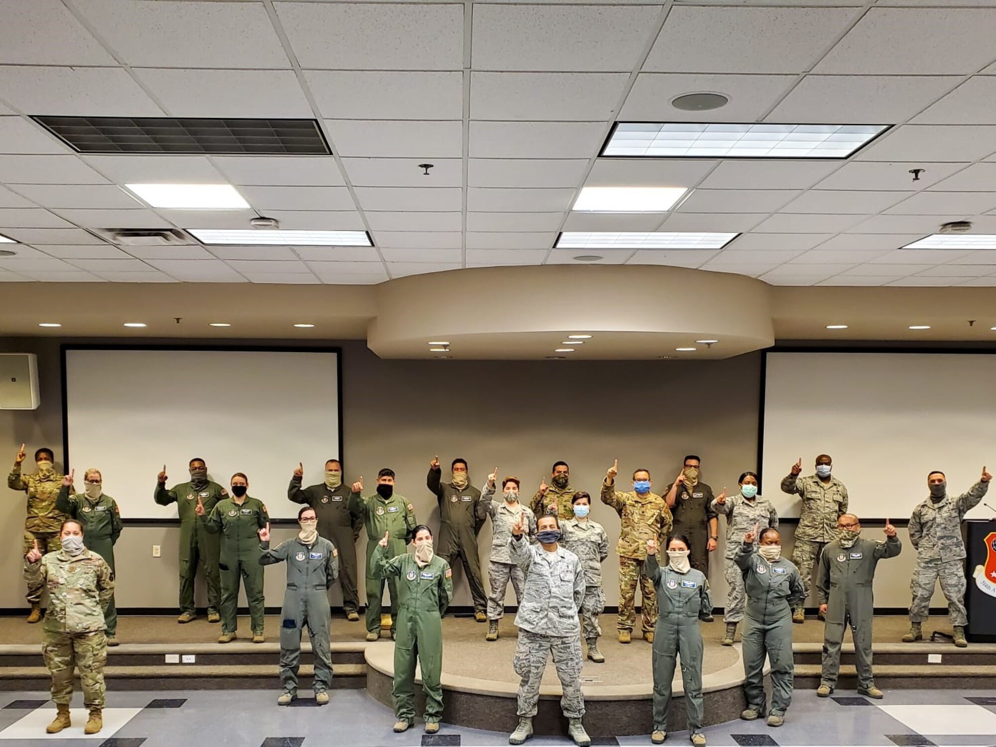 Reserve Citizen Airmen with the 514th Aeromedical Evacuation Squadron, 514th Air Mobility Wing, Joint Base McGuire-Dix-Lakehurst, N.J.,  pose for a group photo on April 8, 2020.