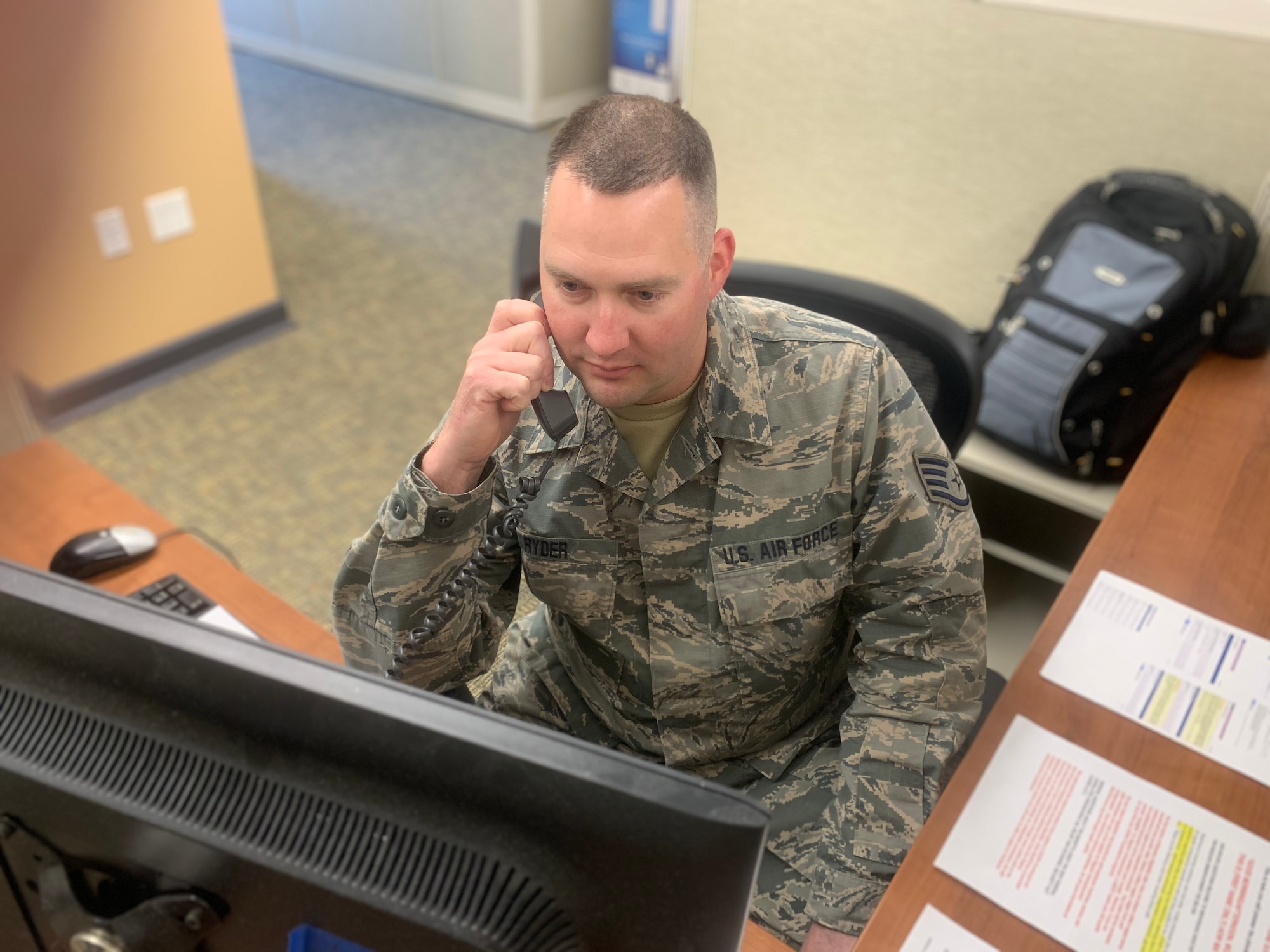 Staff Sgt. Jeremy Ryder, an avionics specialist for the 167th Airlift Wing, assists Workforce WV with unemployment claims in Charleston, W.Va., April 4, 2020. West Virginia Gov. Jim Justice directed the West Virginia National Guard to assist after 90,000 workers filed claims in just more than two weeks due to the COVID-19 pandemic.