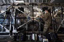 Capt. Naomi King, 628th Operational Medical Readiness Squadron infectious disease team lead, reviews COVID-19 cleaning procedures with Airmen in the Transport Isolation System at Joint Base Charleston, S.C., April 5, 2020.
