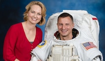 NASA astronaut U.S. Army Col. Andrew Morgan and his wife, Stacey, pose for a studio photograph March 16, 2019, at the Johnson Space Center in Houston, Texas. Morgan, who is the commander of the U.S. Army Space and Missile Defense Command’s Army astronaut detachment, is serving aboard the International Space Station for Expeditions 60, 61 and 62. Stacey is a military family advocate, writer and public speaker.  (NASA Courtesy Photo)