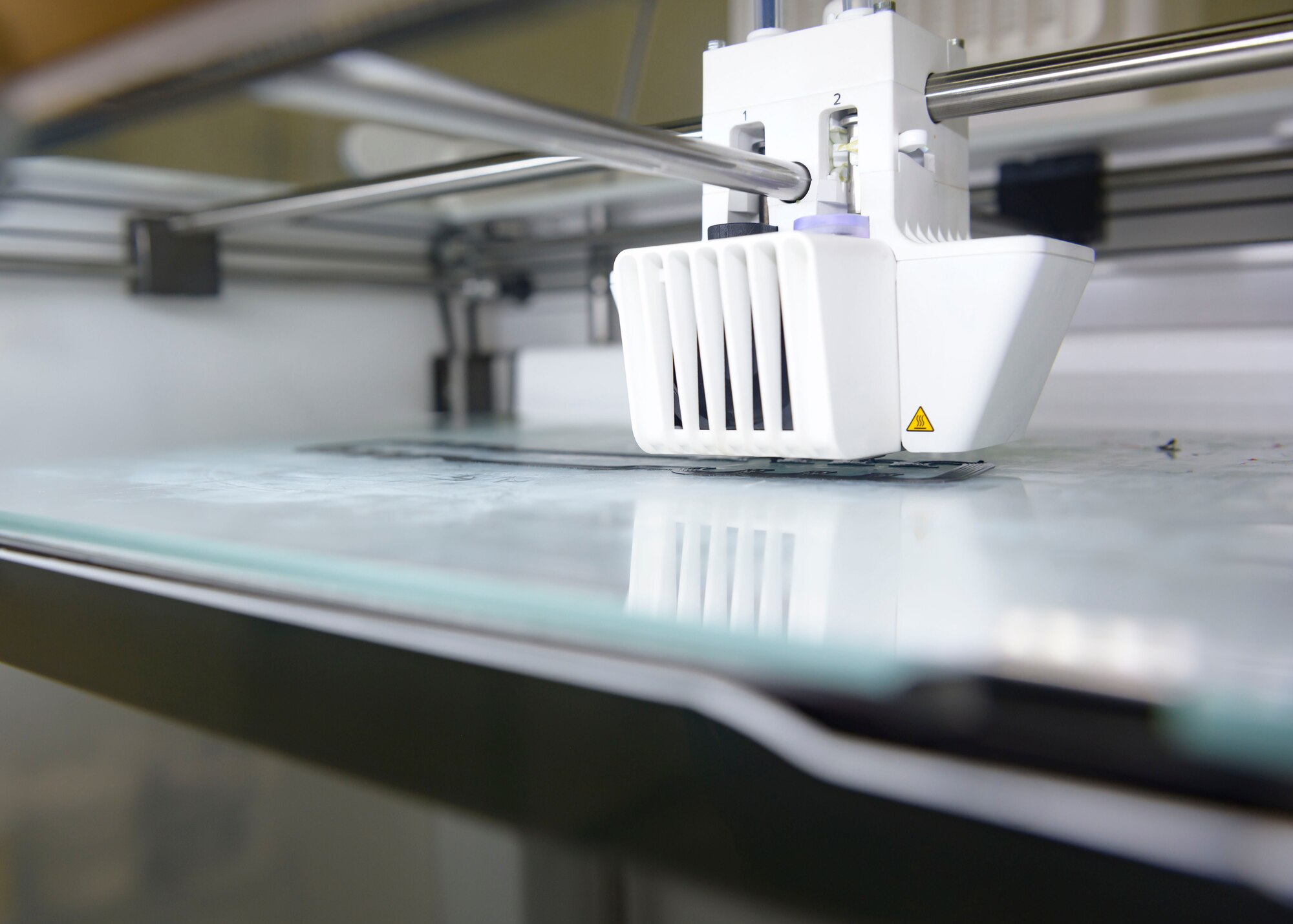 A 3D printer prints Ear Savers, March 8, 2020, at Mountain Home Air Force Base, Idaho. The Ear Savers are designed to hook the elastic bands of face masks, bypassing hooking to the ear, preventing scratches and irritation. (U.S. Air Force photo by Senior Airman Tyrell Hall)