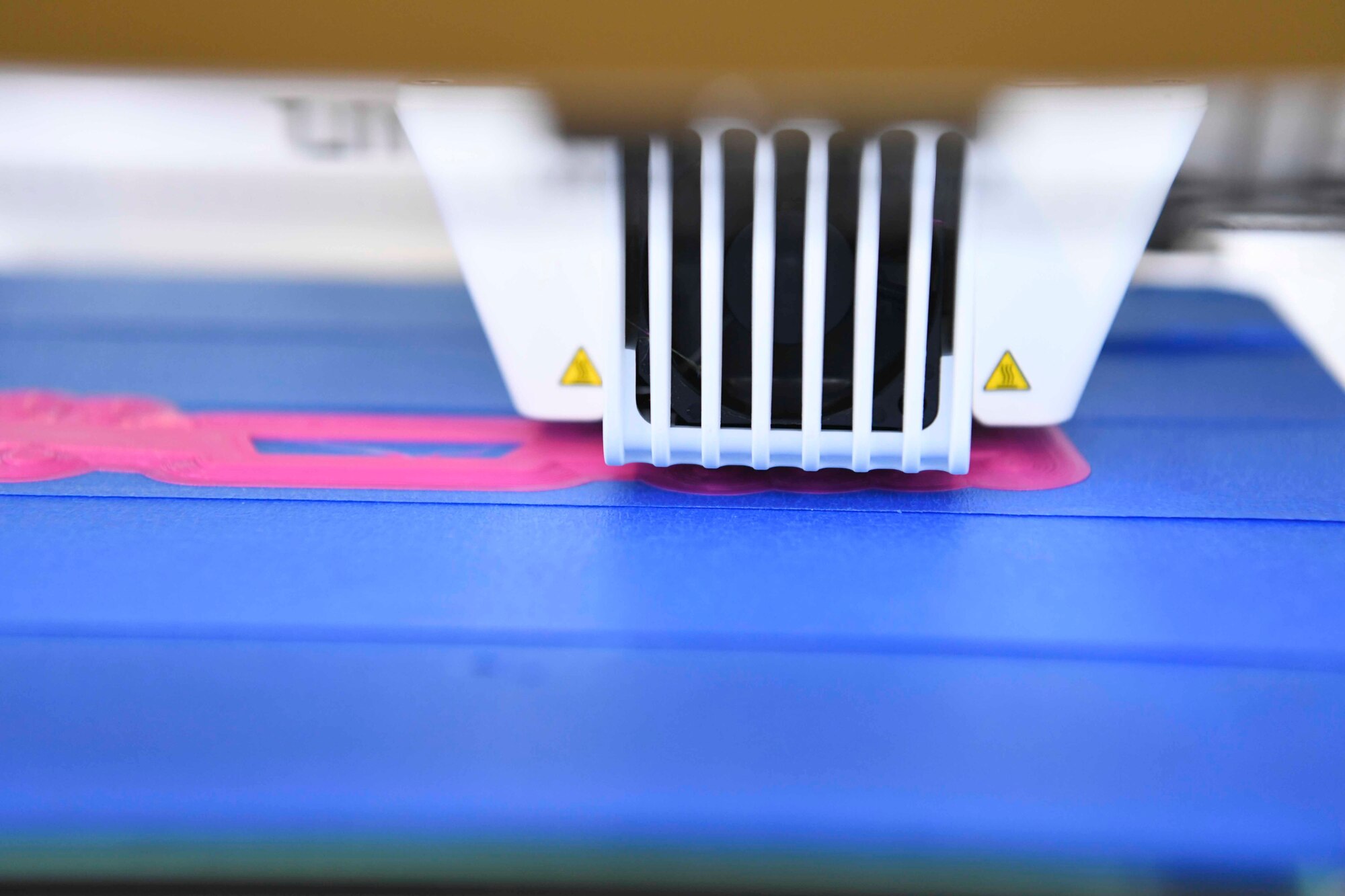 A 3D printer at the SparkX Cell Innovation and Idea Center on Joint Base Andrews prints a part for a facemask at JBA, Md., Apr. 8, 2020. There are multiple types of printing material that can be used including polylactic acid, Acrylic Styrene Acrylonitrile (ASA) and even wood. SparkX Cell team members have been making prototype personal protective equipment in an effort to help prevent the spread of COVID-19. (U.S. Air Force photo by Airman 1st Class Spencer Slocum)