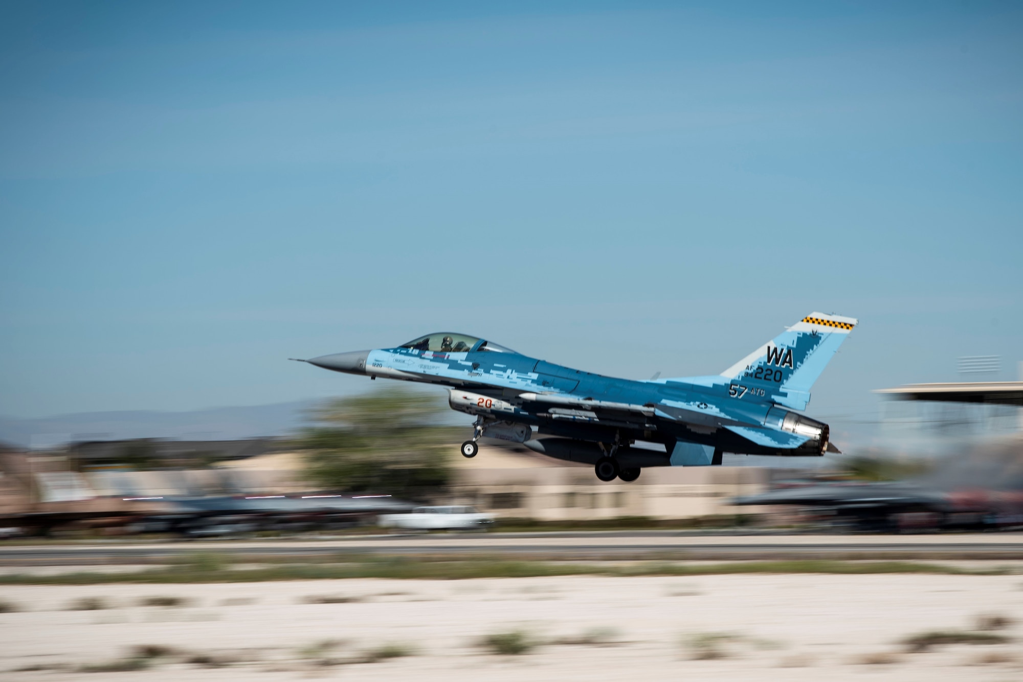 An F-16 Fighting Falcon fighter jet takes off.