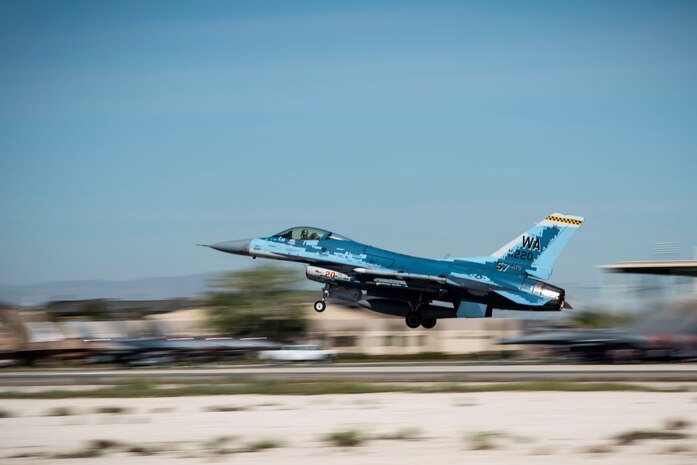 An F-16 Fighting Falcon fighter jet takes off.