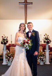 Newlyweds Austin Matthew Howard and Amanda Elizabeth Howard graduate Basic Military Training together March 26. (Courtesy Photo )