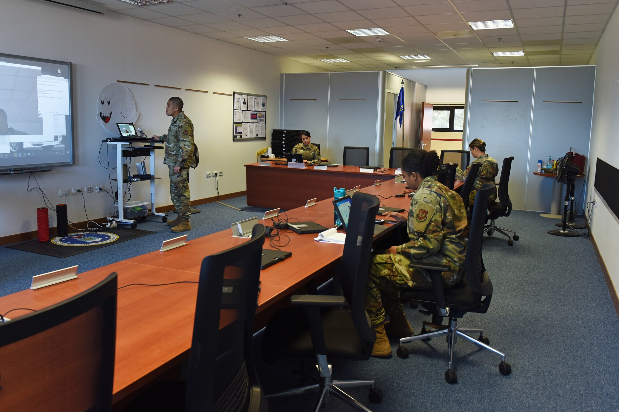 Tech. Sgt. Adam K. Ginett Airman Leadership School staff run through practice lessons in preparation for a virtual ALS course at Aviano Air Base, Italy, April 9, 2020. The ALS staff has turned to virtual options in response to COVID-19 and will be the first virtual ALS course throughout the Air Force. (U.S. Air Force photo by Staff Sgt. Valerie Halbert)