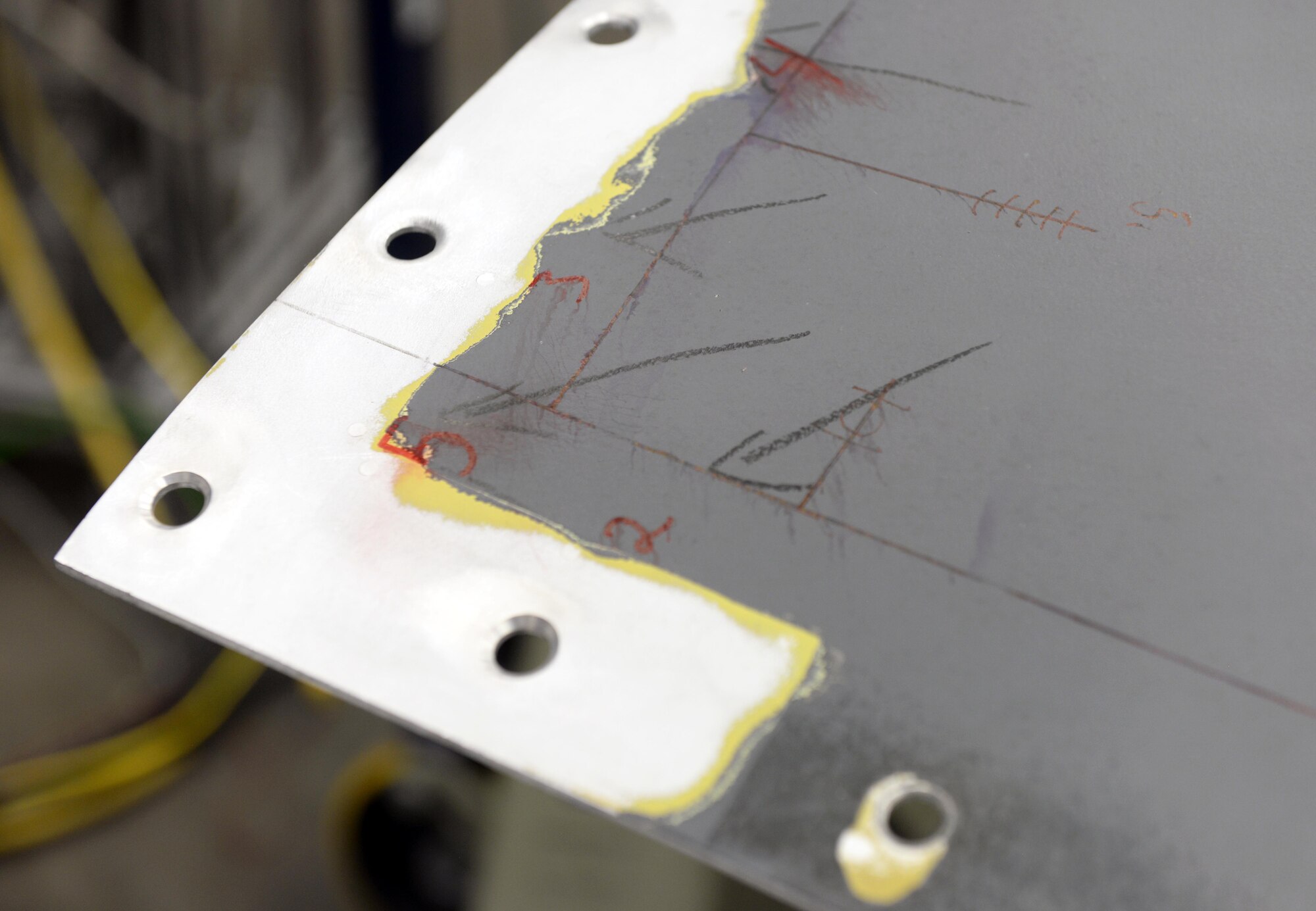 A Forward Equipment Bay panel for a B-1B Lancer is prepped for a cold spray repair.