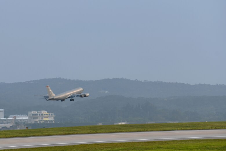 A U.S. Air Force KC-135 Stratotanker, assigned to the 909th Air Refueling Squadron, takes off April 9, 2020, at Kadena Air Base, Japan. Team Kadena is postured to protect its forces against COVID-19 while also maintaining mission readiness in support of the U.S.-Japan Alliance. The 909th ARS conducts aerial refueling missions throughout the region ensuring a free and open Indo-Pacific. (U.S. Air Force photo by Airman 1st Class Rebeckah Medeiros)