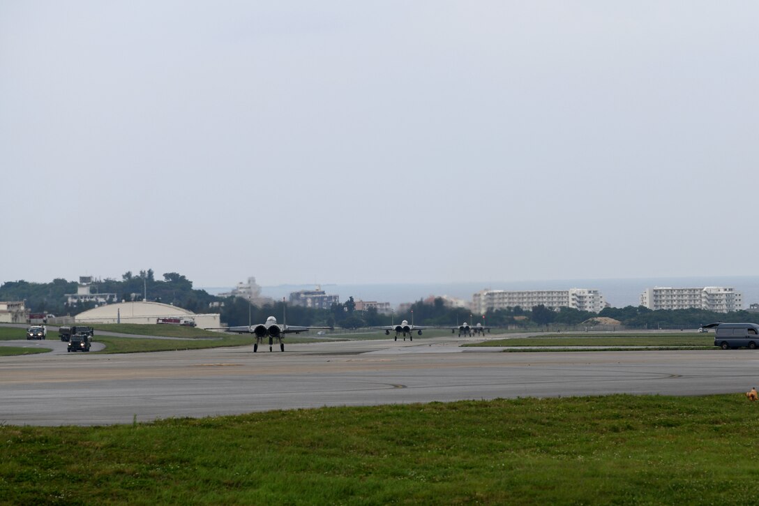 An F-15C Eagle takes off from Kadena Air Base, Japan, Apr. 9, 2020. The F-15C Eagle is a maneuverable, tactical fighter designed to gain and maintain air supremacy over the battlefield. In order to ensure mission success, the Airmen of Team Kadena continuously rise to meet mission requirements and ensure air superiority. (U.S. Air Force photo by Airman 1st Class Rebeckah Medeiros)