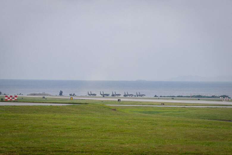 F-15C Eagles taxi down the runway on Kadena Air Base, Japan, Apr. 9, 2020. The F-15C Eagle is a maneuverable, tactical fighter designed to gain and maintain air supremacy over the battlefield. In order to ensure mission success, the Airmen of Team Kadena continuously rise to meet mission requirements and ensure air superiority. (U.S. Air Force photo by Staff Sgt. Kristan Campbell)