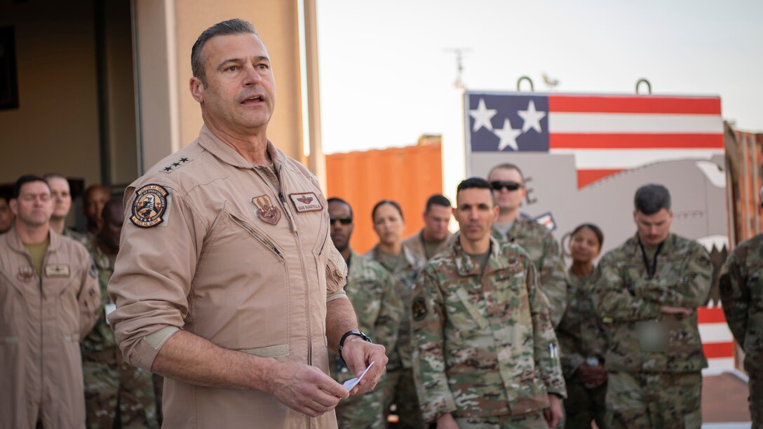 U.S. Air Force Lt. Gen. Joseph Guastella, U.S. Air Forces Central Command Commander, speaks with AFCENT Airmen outside of the combined air operations center at Al Udeid Air Base, Qatar, March 6, 2020.