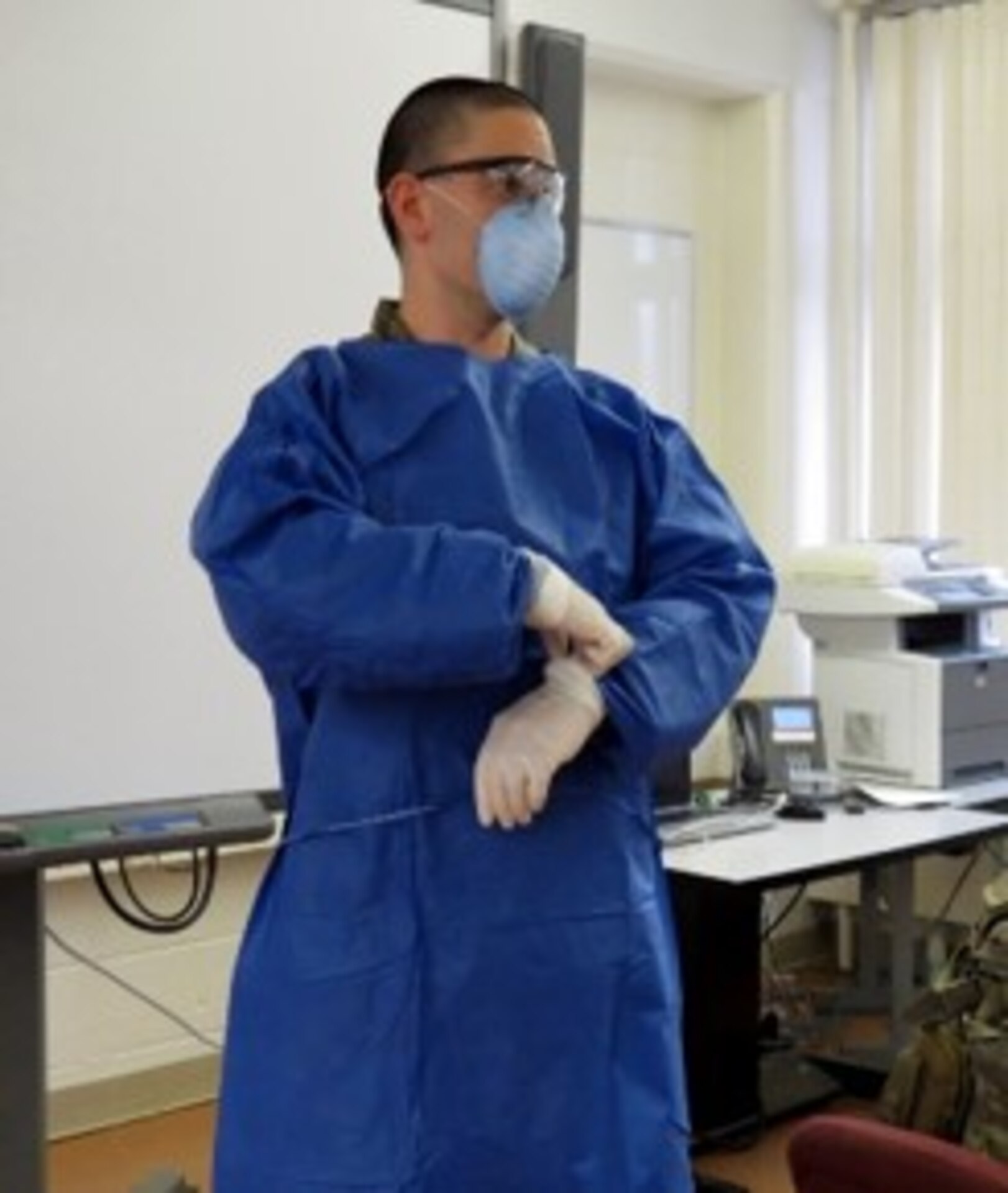 As part of the Army Reserve's efforts to support COVID-19 medical operations, Soldiers from the 804th Med. Bde. train on proper wear of personal protective equipment. These Soldiers are part of  Urban Augmentation Medical Task Force (UAMTF) teams providing medical support in ew York, New Jersey and Connecticut.