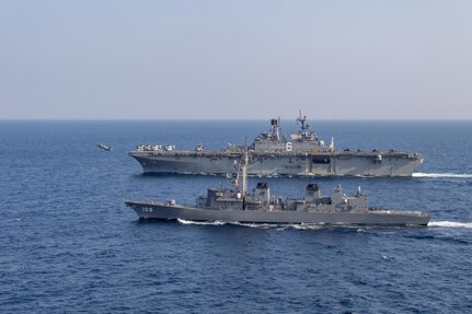 Amphibious assault ship USS America (LHA 6) launches an F-35B Lightning II assigned to the 31st Marine Expeditionary Unit, Marine Medium Tiltrotor (VMM) 265 (Reinforced) while sailing in formation with Japanese Maritime Self-Defense Force JS Akebono (DD 108). America, flagship of the America Expeditionary Strike Group, 31st Marine Expeditionary Unit team, is operating in the U.S. 7th Fleet area of operations to enhance interoperability with allies and partners and serve as a ready response force to defend peace and stability in the Indo-Pacific region.