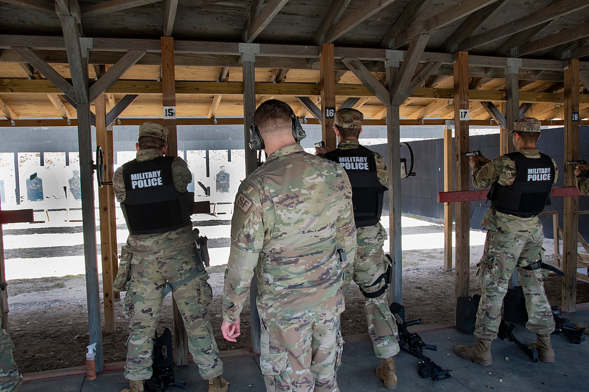 The 104th Fighter Wing Combat Arms Training and Maintenance Instructors ensure Infantrymen from 1st Battalion, 182nd Infantry Regiment, Bravo Company are currently qualified on the M9 pistol. The Massachusetts National Guard Infantrymen are activated in response to COVID-19 to ensure there is enough manpower available to safeguard the 104th Fighter Wing assets and personnel. These precautions are being taken to mitigate any manning shortages that may occur due to unforeseen illness and will allow back up for the wing’s Security Forces. During the pandemic, the infantrymen will be working alongside the 104th Security Forces to reinforce security for the 104th Fighter Wing F-15 homeland defense flying mission to maintain air superiority.(U.S. Air National Guard Photo by Senior Master Sgt. Julie Avey)