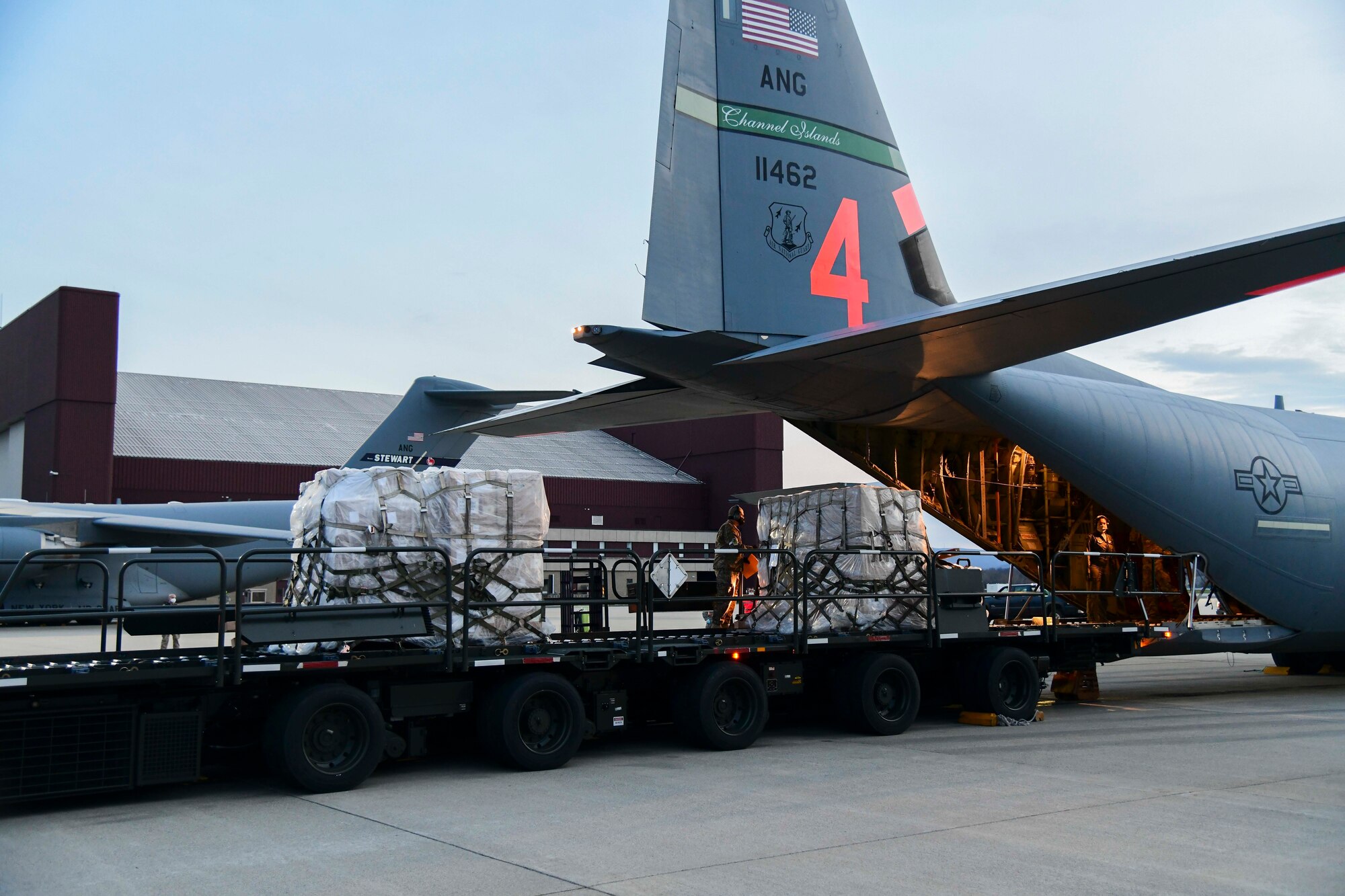 Airmen from the 146th Airlift Wing of the California Air National Guard in Oxnard, CA, deliver 200 ventilators to the  New York Air National Guard's  105th Airlift wing on April 7, 2020, at Stewart Air National Guard Base, Newburgh, NY. The use of the C-130J Super Hercules, along with the help of New York Army National Guard Sodliers from the 369th Sustainment Brigade, facilitated the shipment of medical equipment, which will support the ongoing COVID-19 medical response being conducted in the New York and New Jersey areas. Each state will receive 100 of the ventilators  (U.S. Air National Guard  Photo by SrA Jonathan Lane/Released).