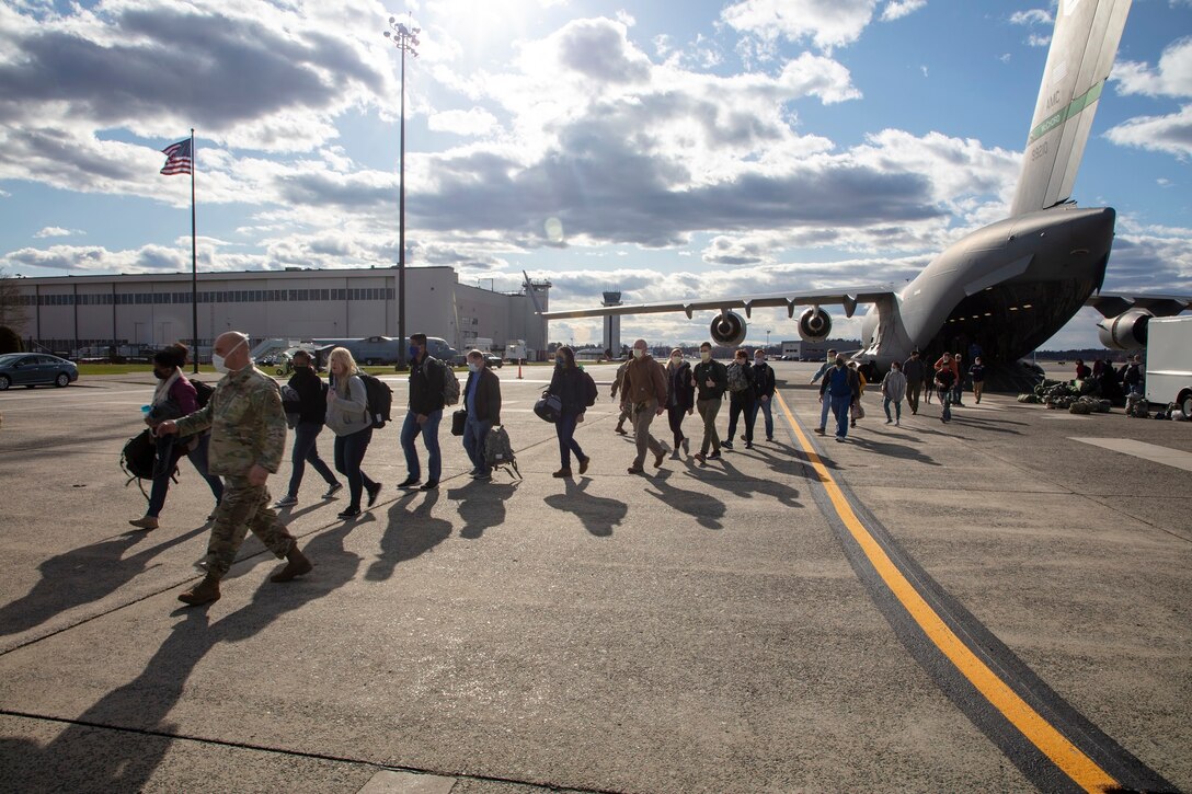 Members of 801st Combat Support Hospital, U.S. Army Reserve, Fort Sheridan, Illinois, arrive on Hanscom Air Force Base