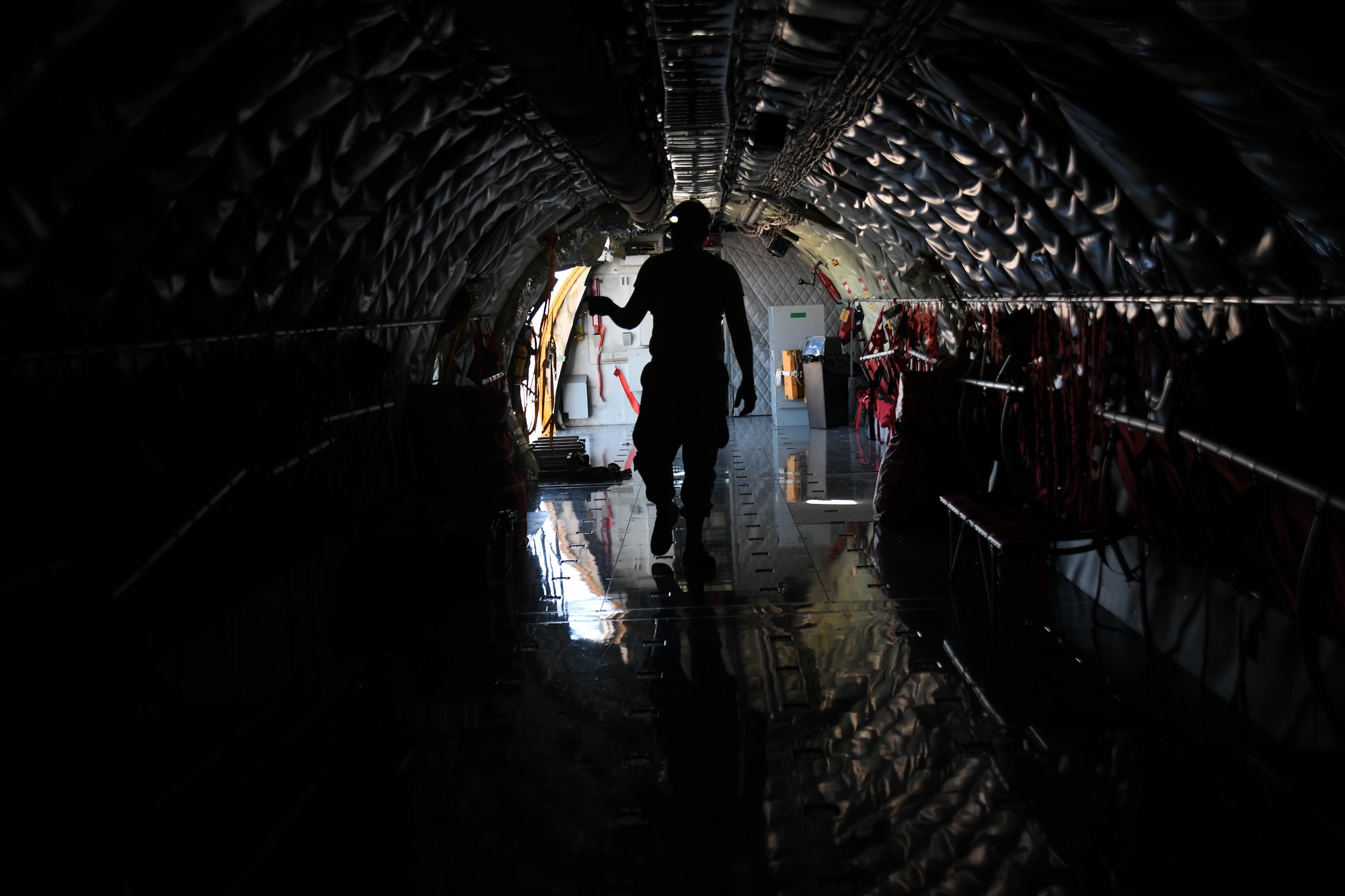 Airman 1st Class Grant Rockers, 22nd Operations Support Squadron aircrew flight equipment technician, counts the number of emergency passenger oxygen systems located in the interior of the KC-135 Stratotanker March 25, 2020, at McConnell Air Force Base, Kansas. AFE technicians play a vital role in delivering mission ready support equipment for aircrews supporting aerial refueling operations. (U.S. Air Force photo by Airman 1st Class Nilsa E. Garcia)