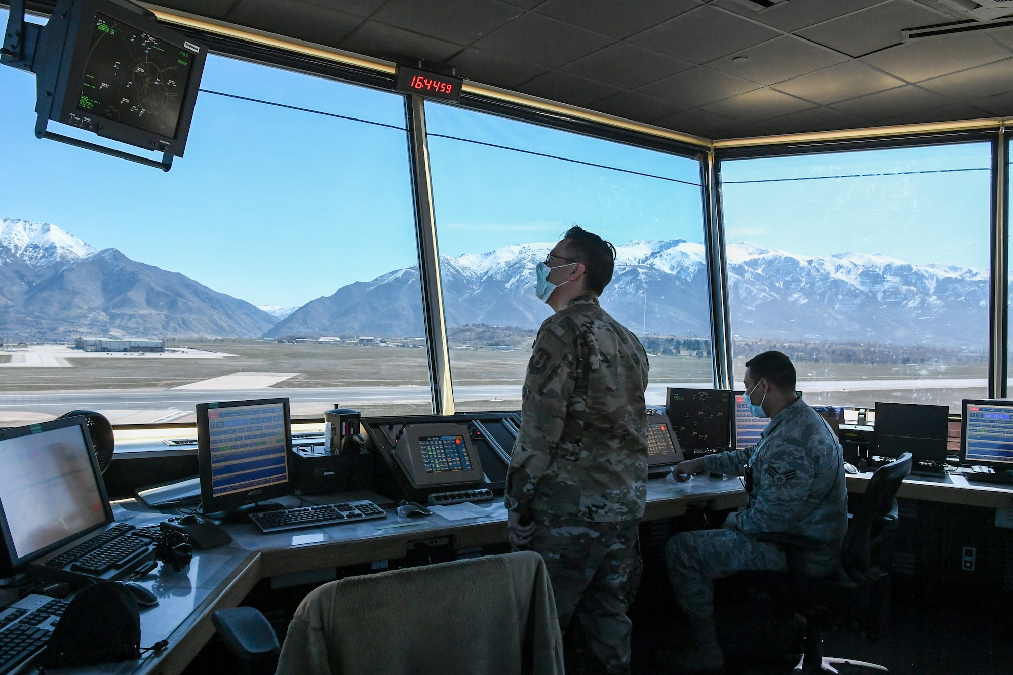 Controllers working in the air traffic control tower.