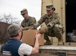 Spc. Janet Fonseca, a motor transport operator with the 1168th Transportation Company, Iowa Army National Guard, delivers medical supplies to Benton County emergency personnel in Vinton, Iowa, April 8, 2020. Fonseca and her husband, Pfc. Cesar Galvan, are both serving on state active duty in the 1168th to transport medical personal protective equipment to help combat the spread of COVID-19.