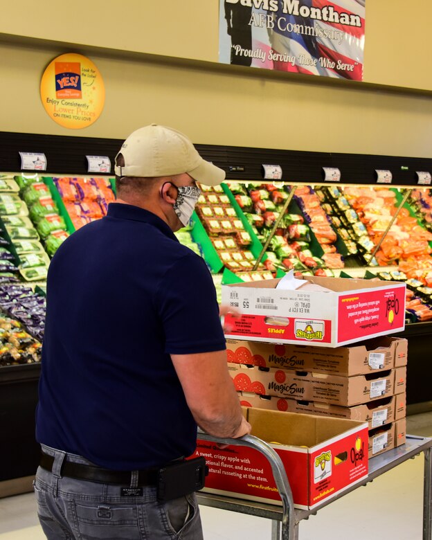 A photo of a commissary employee working